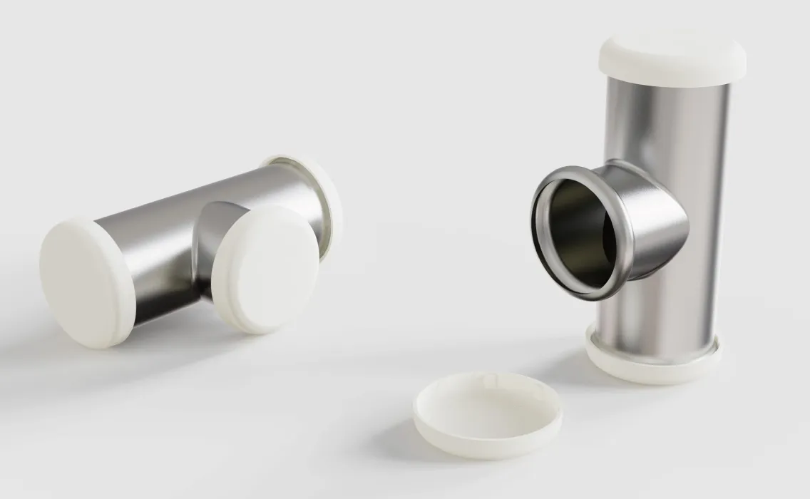Stainless steel cylindrical containers with white caps on a white background, showcasing precision-engineered design for medical or industrial use.