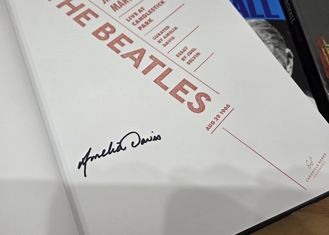 Photographs of the physical book, purchased and inscribed by its compiler, Amelia Davies.