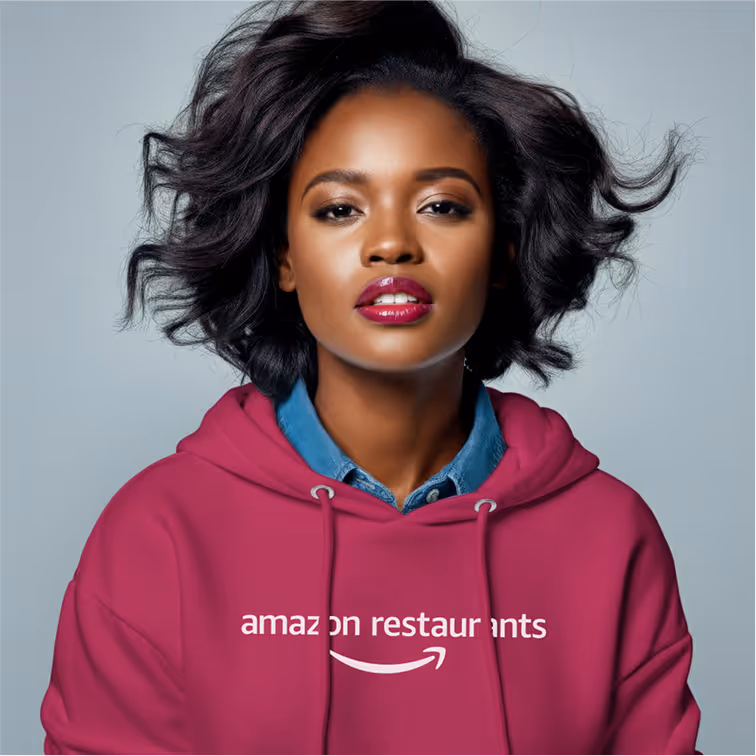 Person wearing magenta hoodie with restaurants branding.