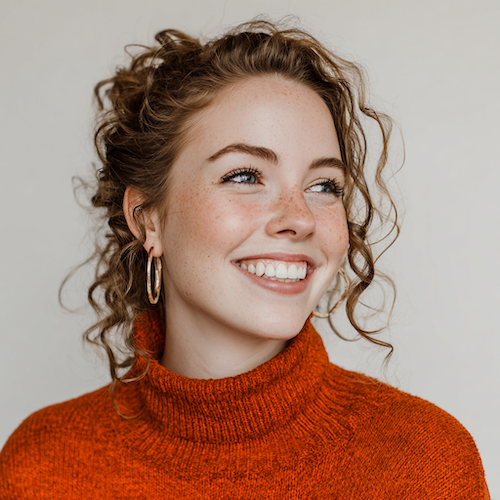 [headshot] image of satisfied student using a laptop