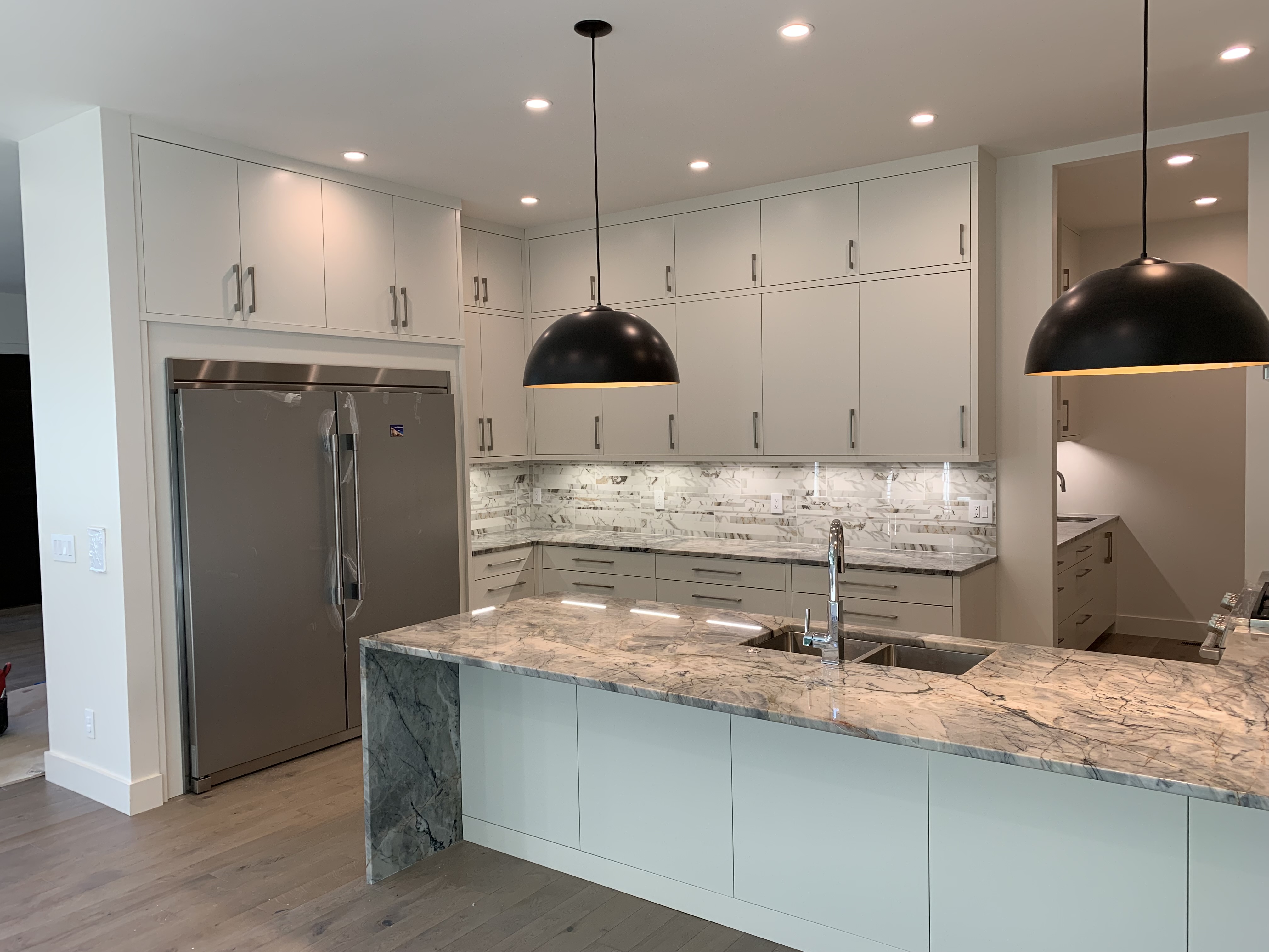 Custom kitchen with large island and modern cabinetry in Asheville, NC