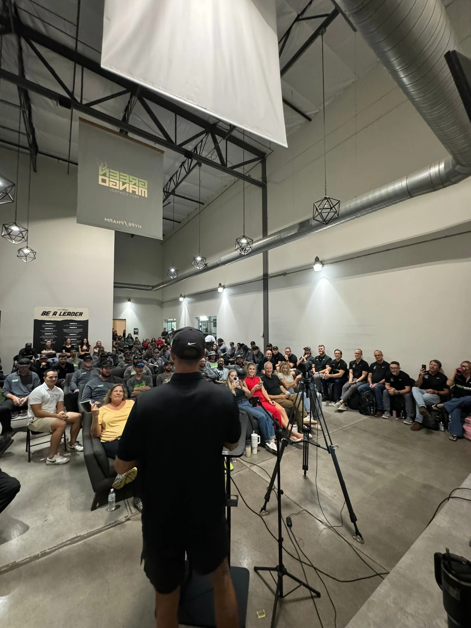 Cameron Bawden leading a group coaching session with entrepreneurs during The 1% Club program