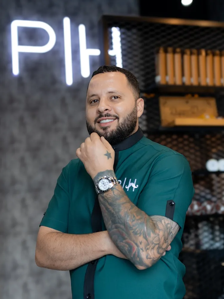 Hussein the Style Master barber specializing in all hair types at Dubai barbershop