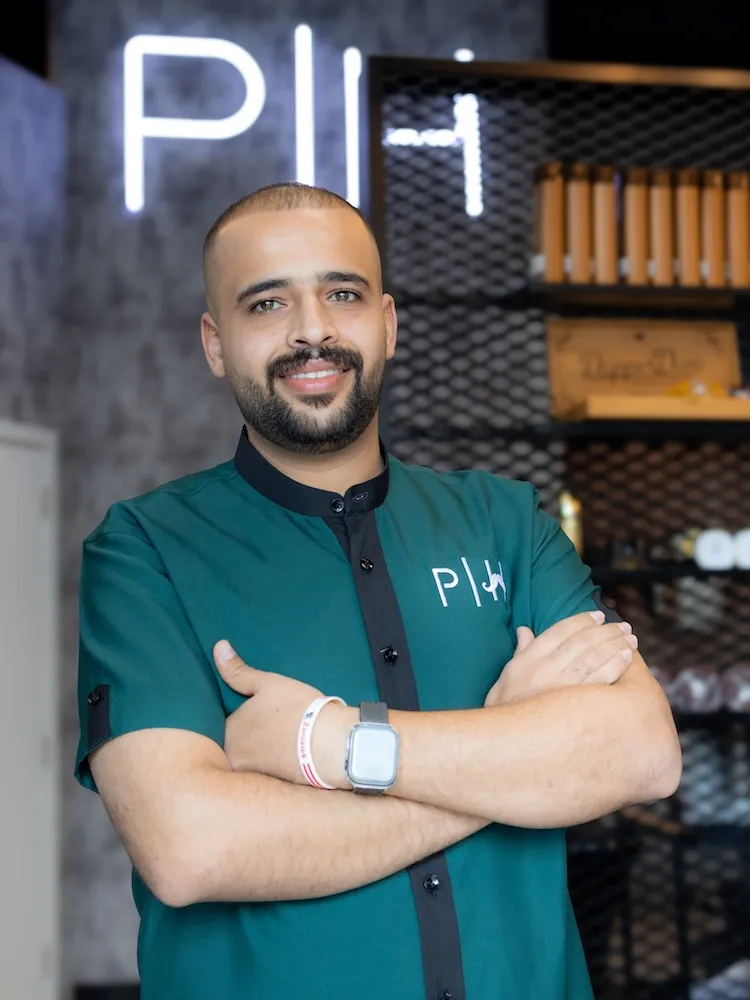 Hussein the Style Master barber specializing in all hair types at Dubai barbershop