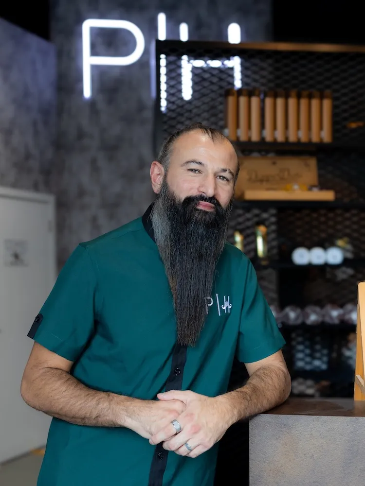 Hussein the Style Master barber specializing in all hair types at Dubai barbershop