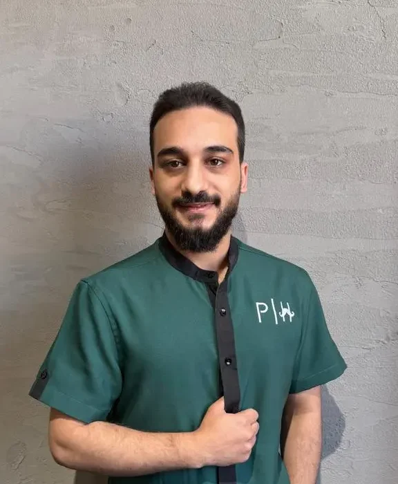 Hussein the Style Master barber specializing in all hair types at Dubai barbershop