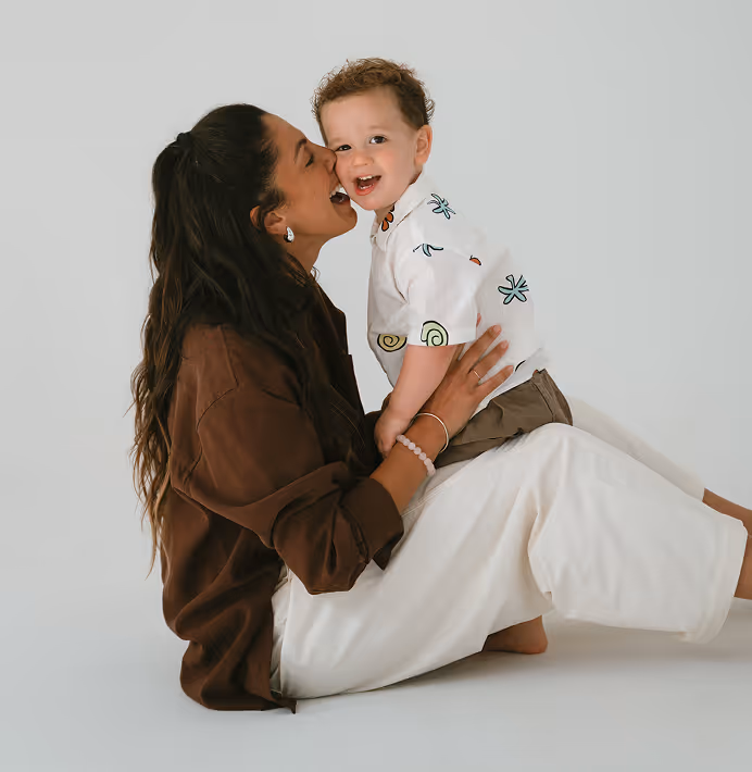 a woman holding a baby