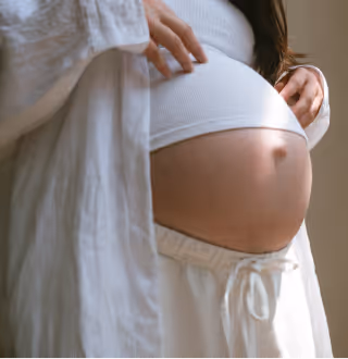 a close-up of a pregnant woman's belly