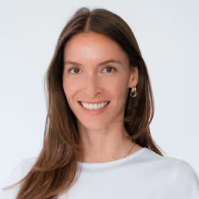 a woman smiling at the camera