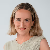 a woman smiling at camera
