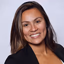 a woman smiling at the camera