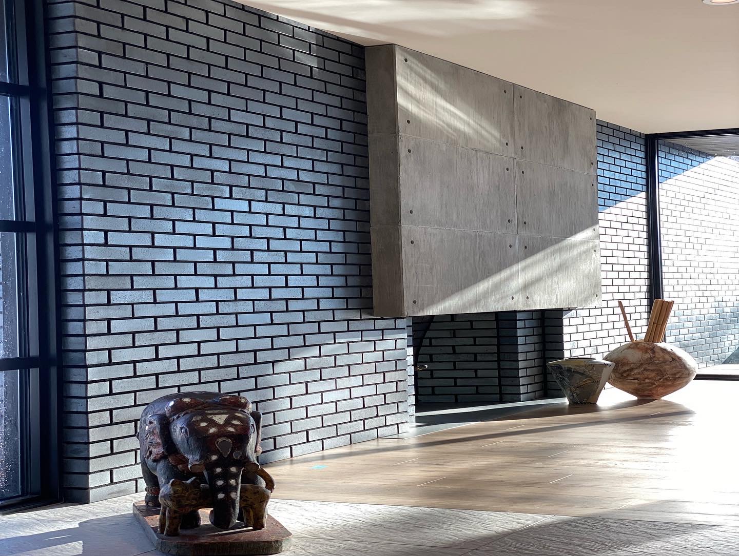 Finished brick and concrete wall