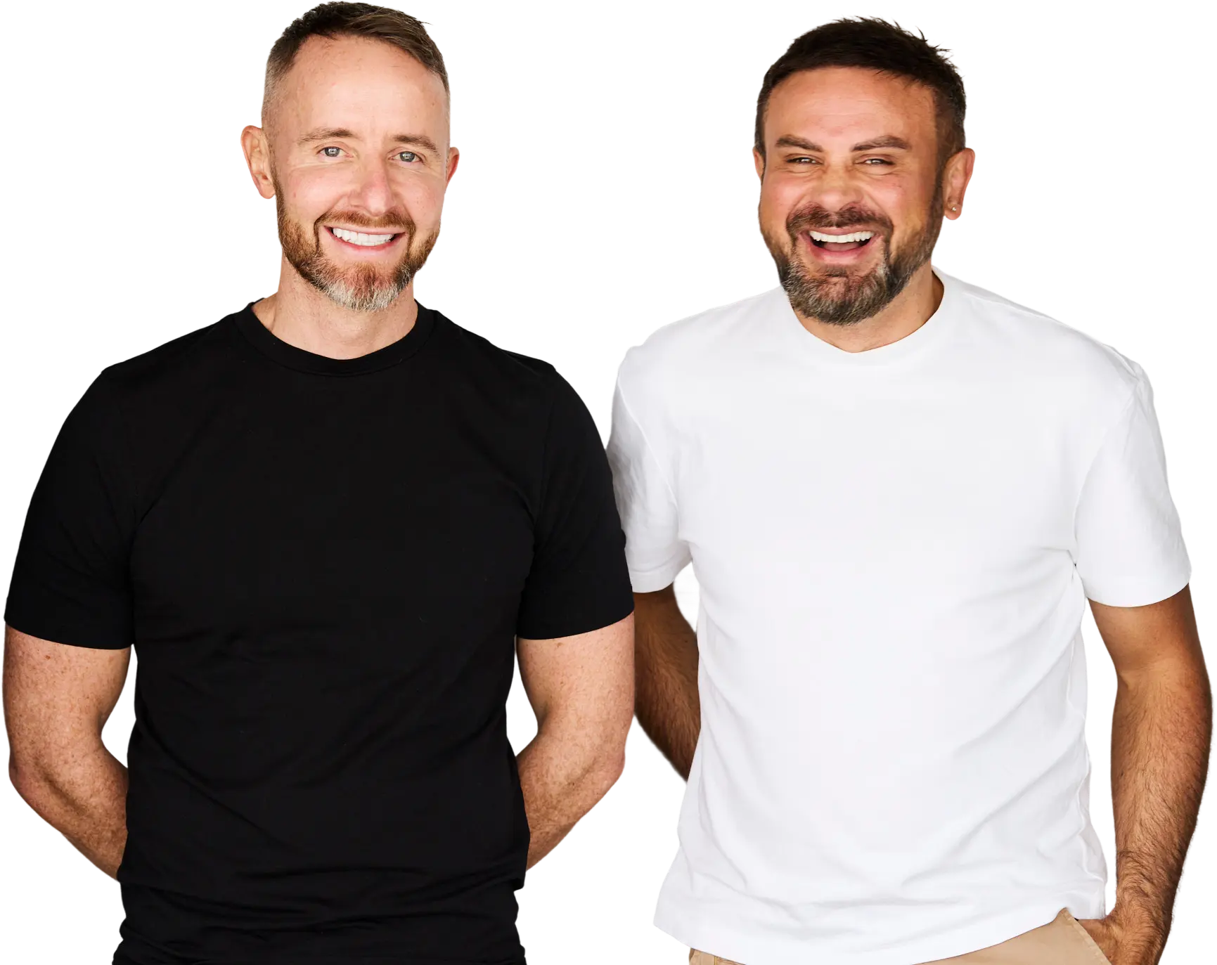 Two men standing next to each other in front of a black background.
