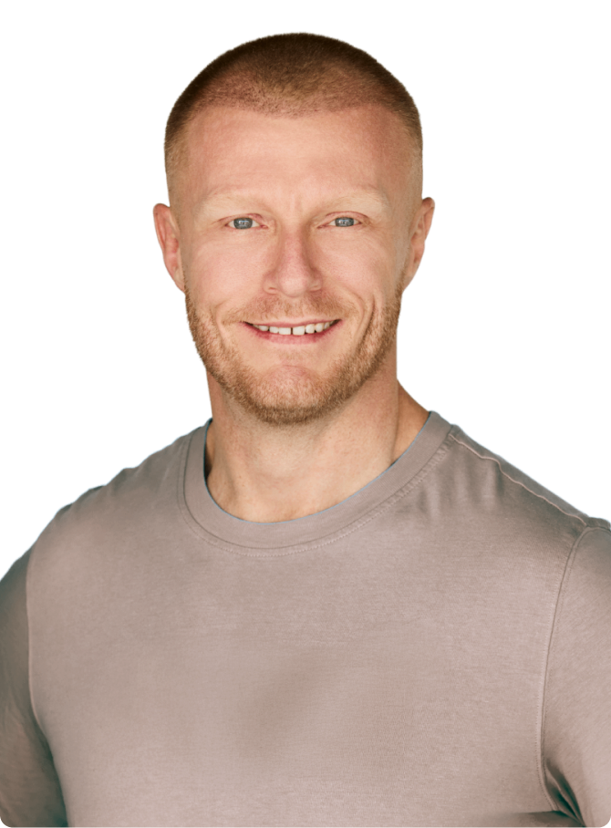 A man with a toothbrush in his mouth.