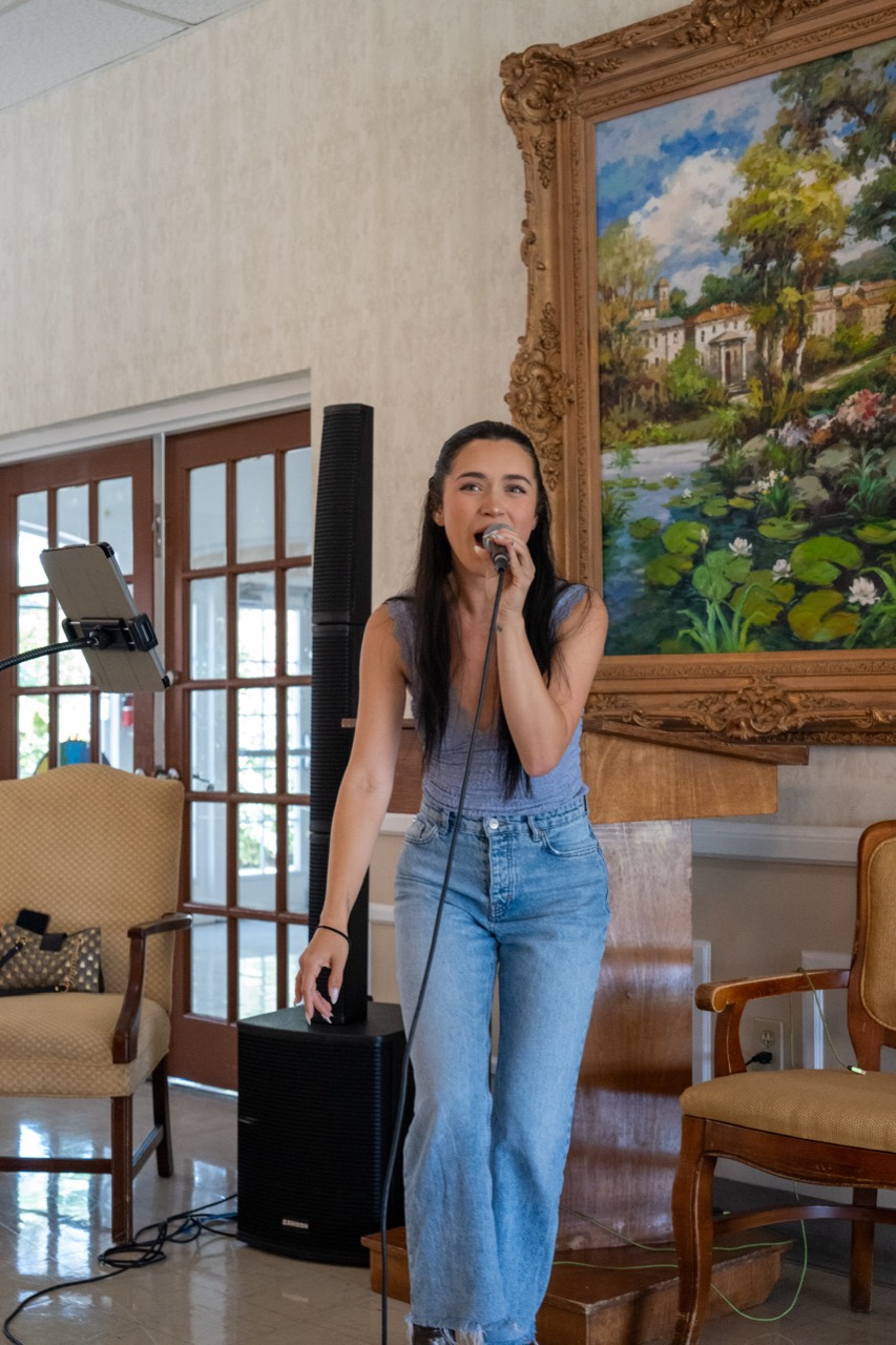 Professional vocalist performing at a Senior Living community event