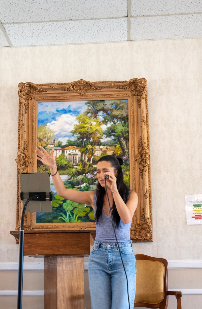 Professional vocalist at work during a Senior Living community program
