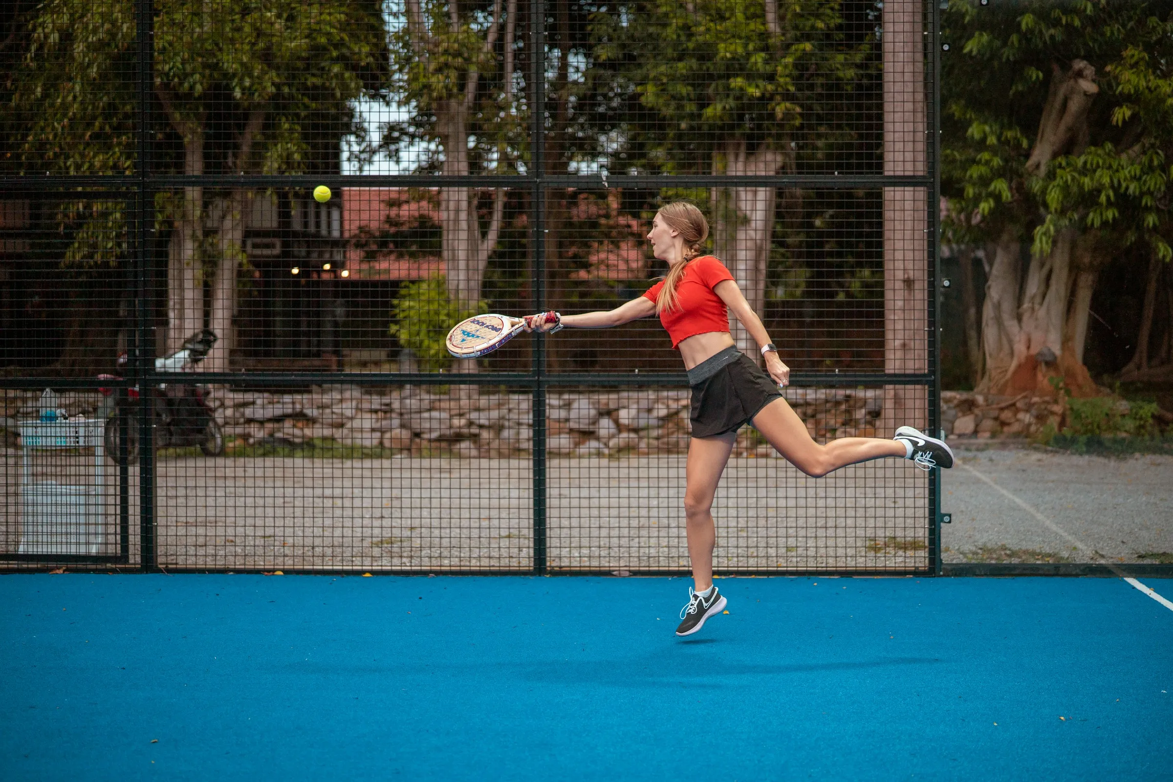 Women Catching Padel Ball