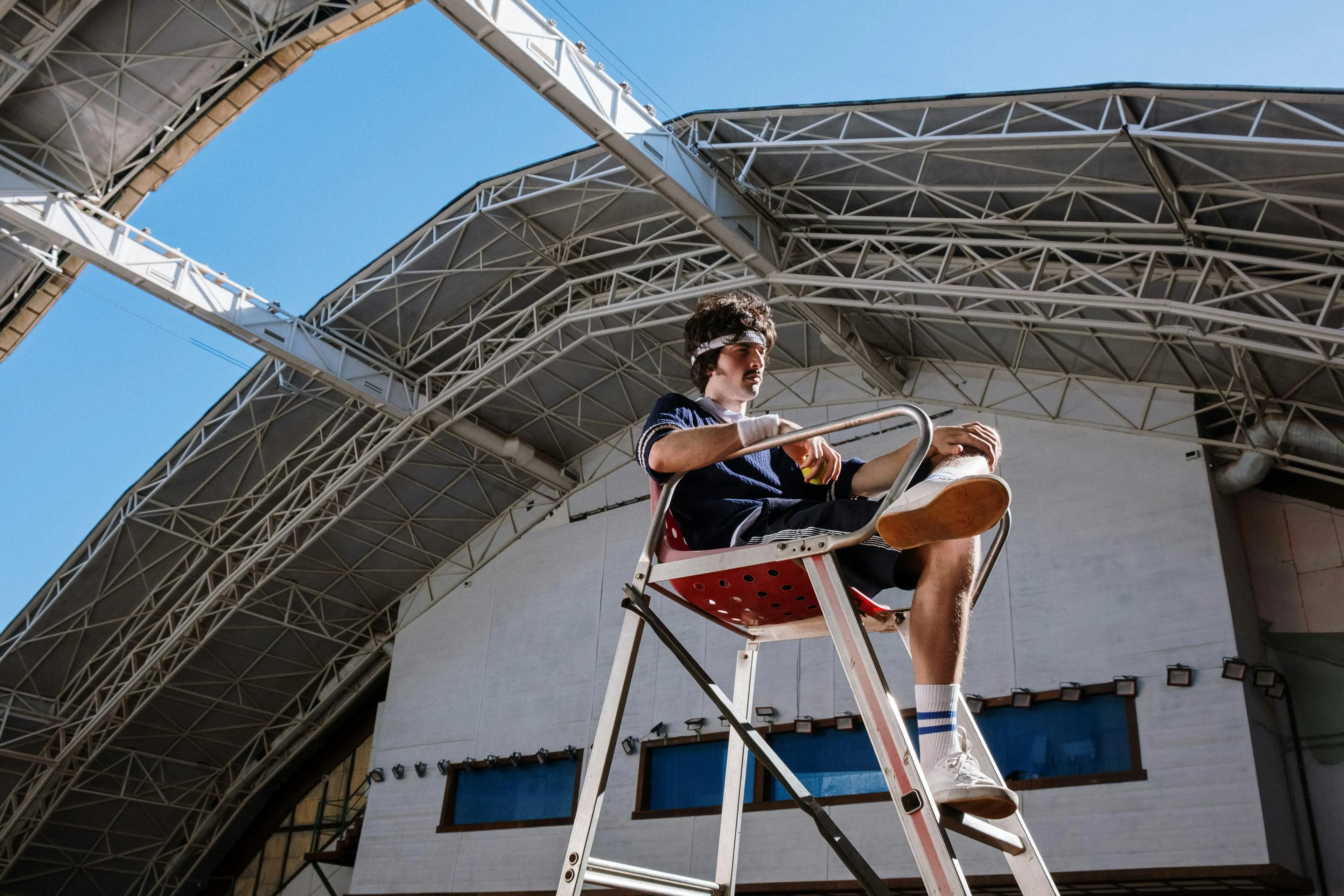 Man Sitting on the Referee Stand