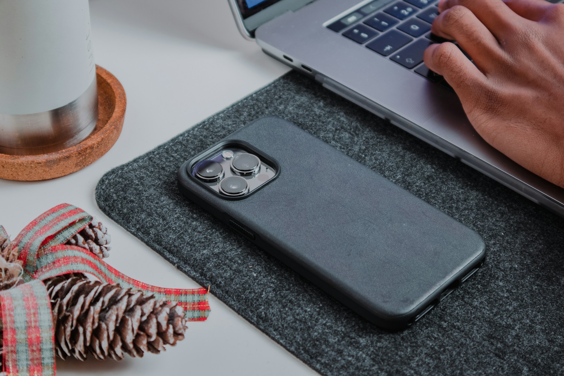 Phone Laying and Person Working - Prop Firm Reviews