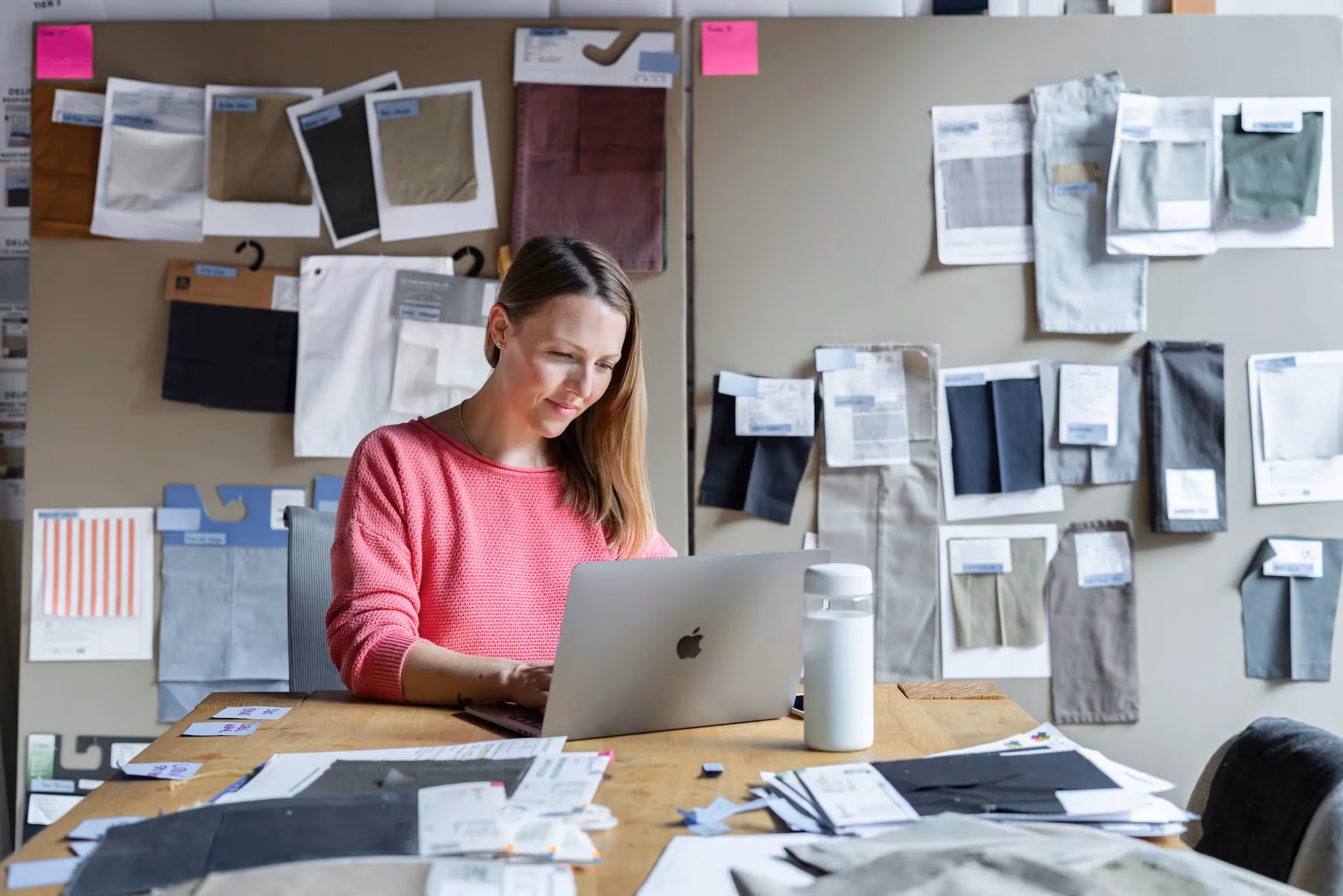 woman working on a laptop - Best Prop Firm Challenge