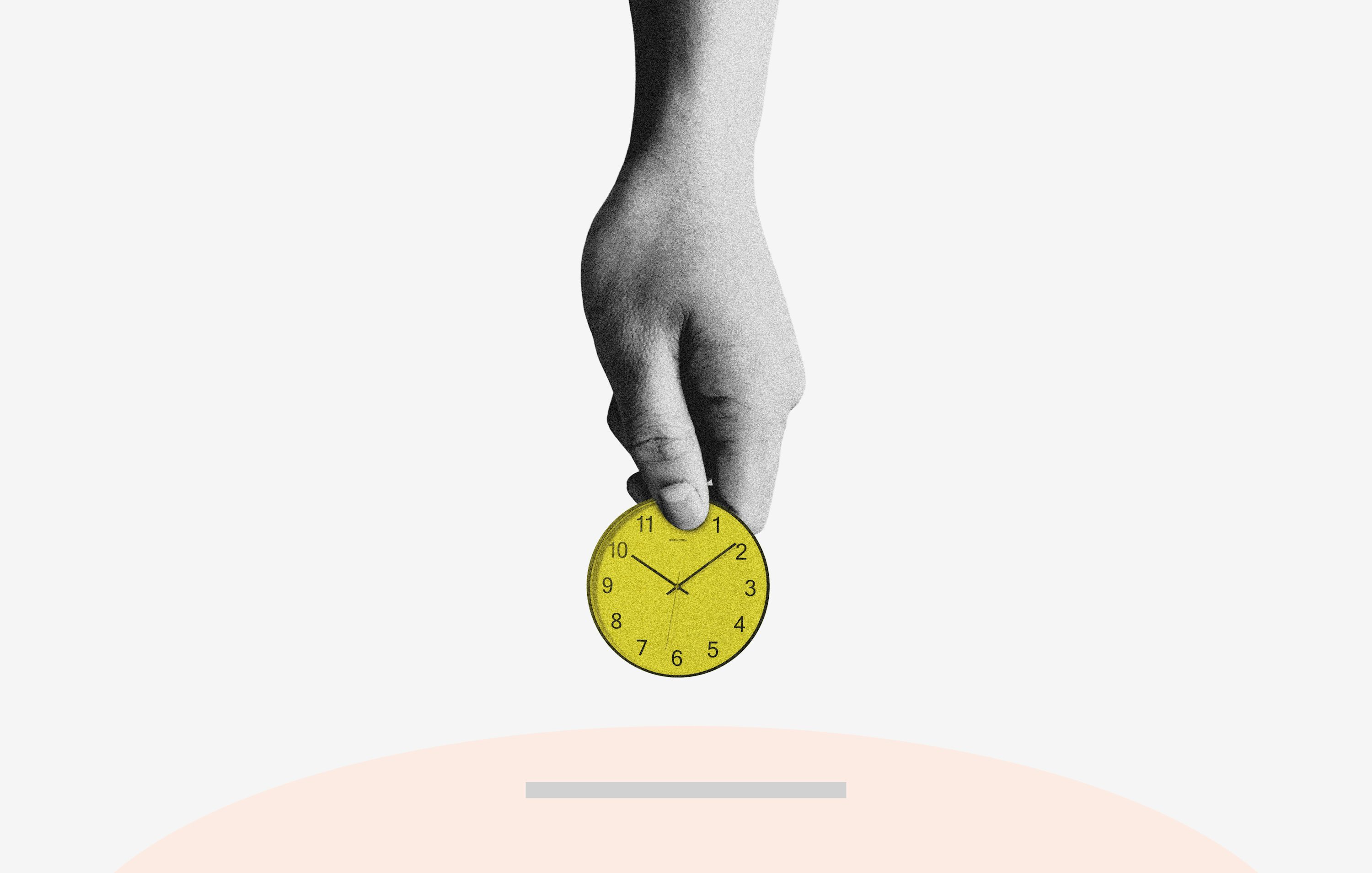 person holding yellow round analog clock - Prop Firms With No Time Limit