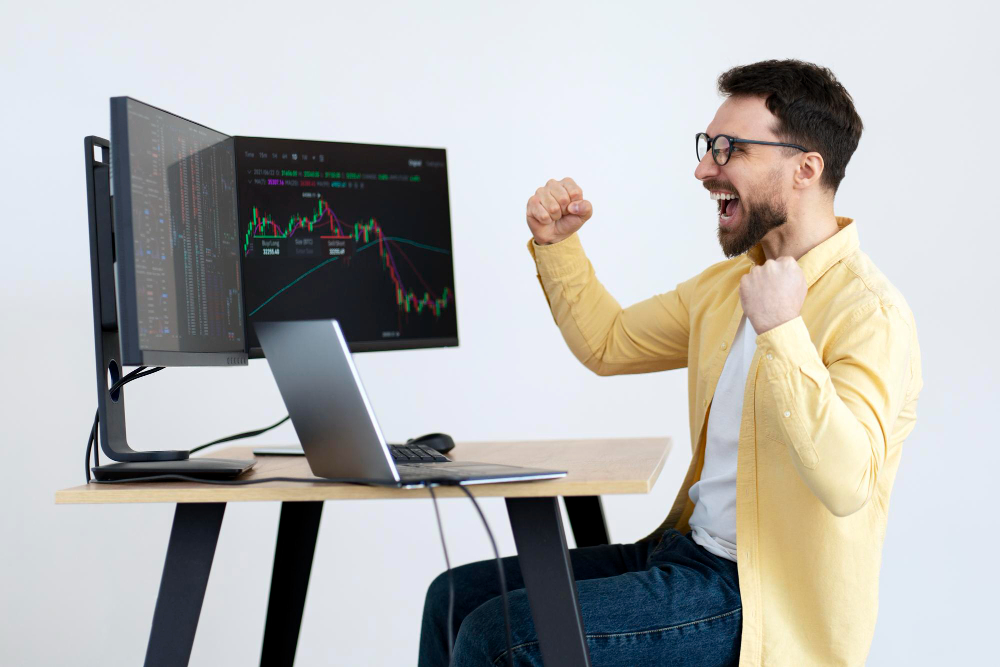 man trading and looking happy - Day Trading vs Options