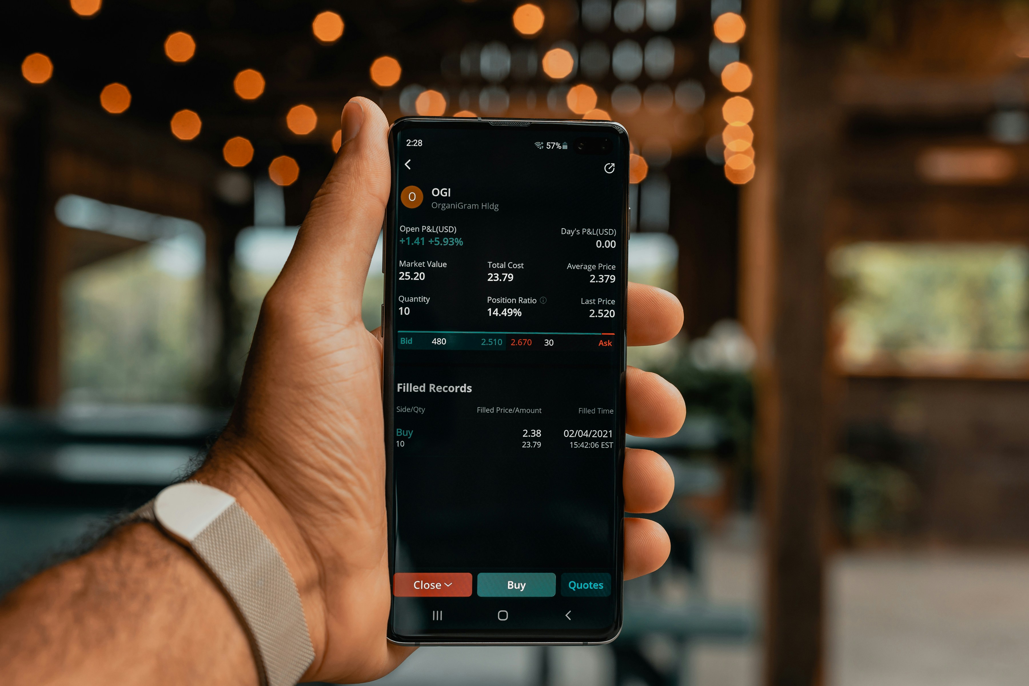 trading on a phone - AscendX Capital
