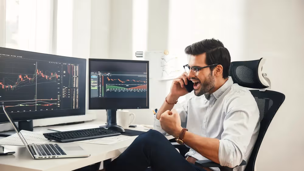man looking happy - What Challenges Do Traders Face