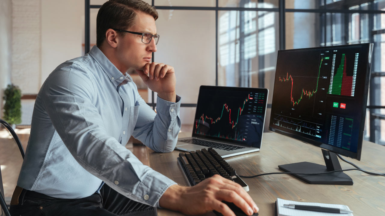 man working hard - Forex Hedging Strategies