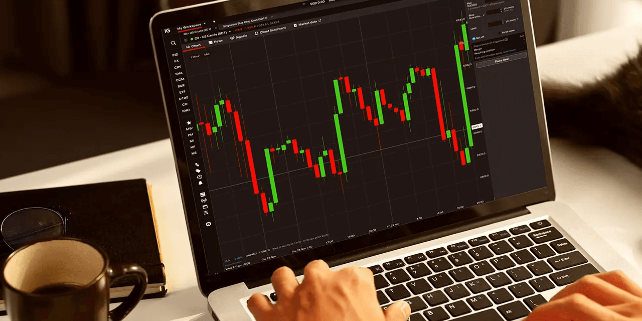 Person analyzing stock charts on laptop - How Does Forex Trading Work