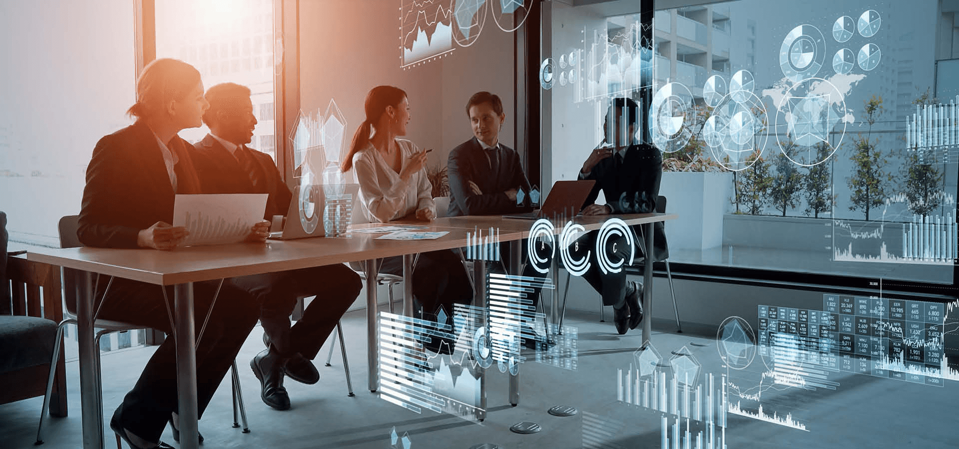 Team members analyzing data together - Capital Growth Strategy