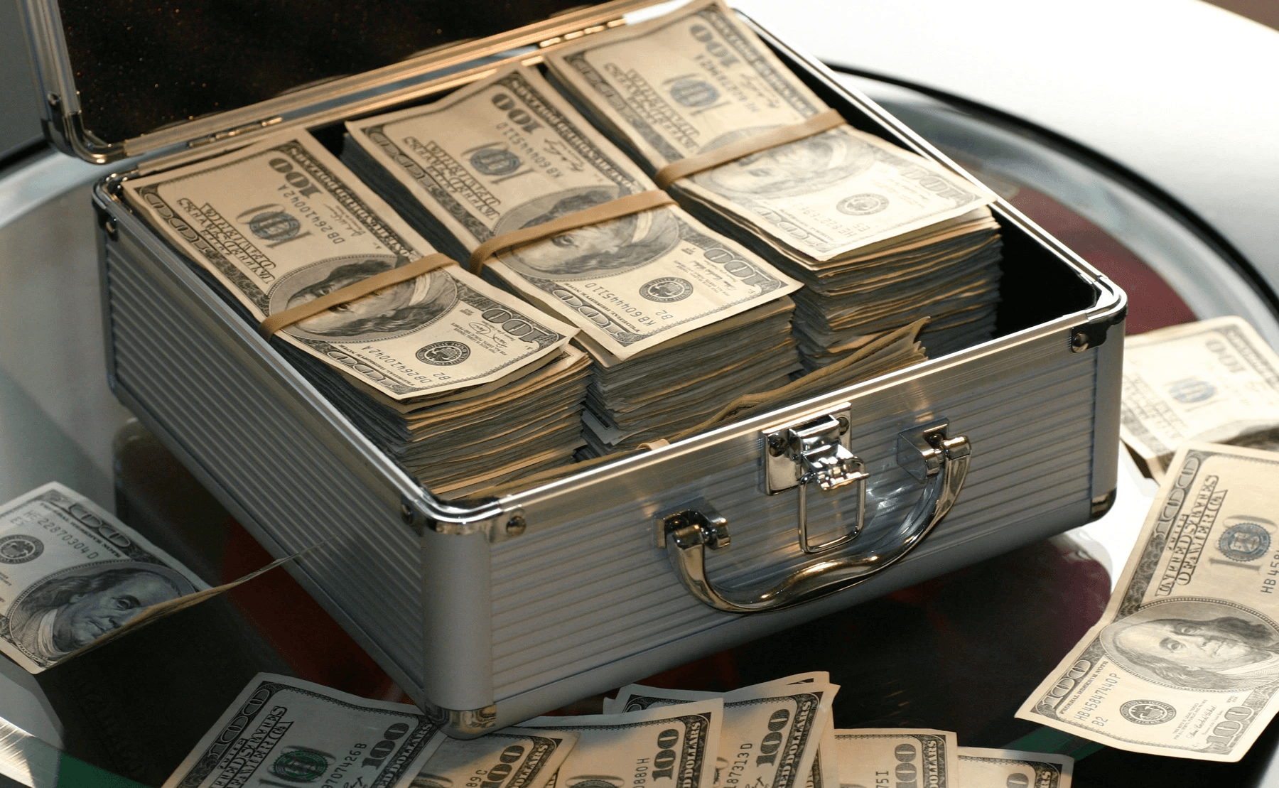  Briefcase full of stacked cash - Cash Reserve Account