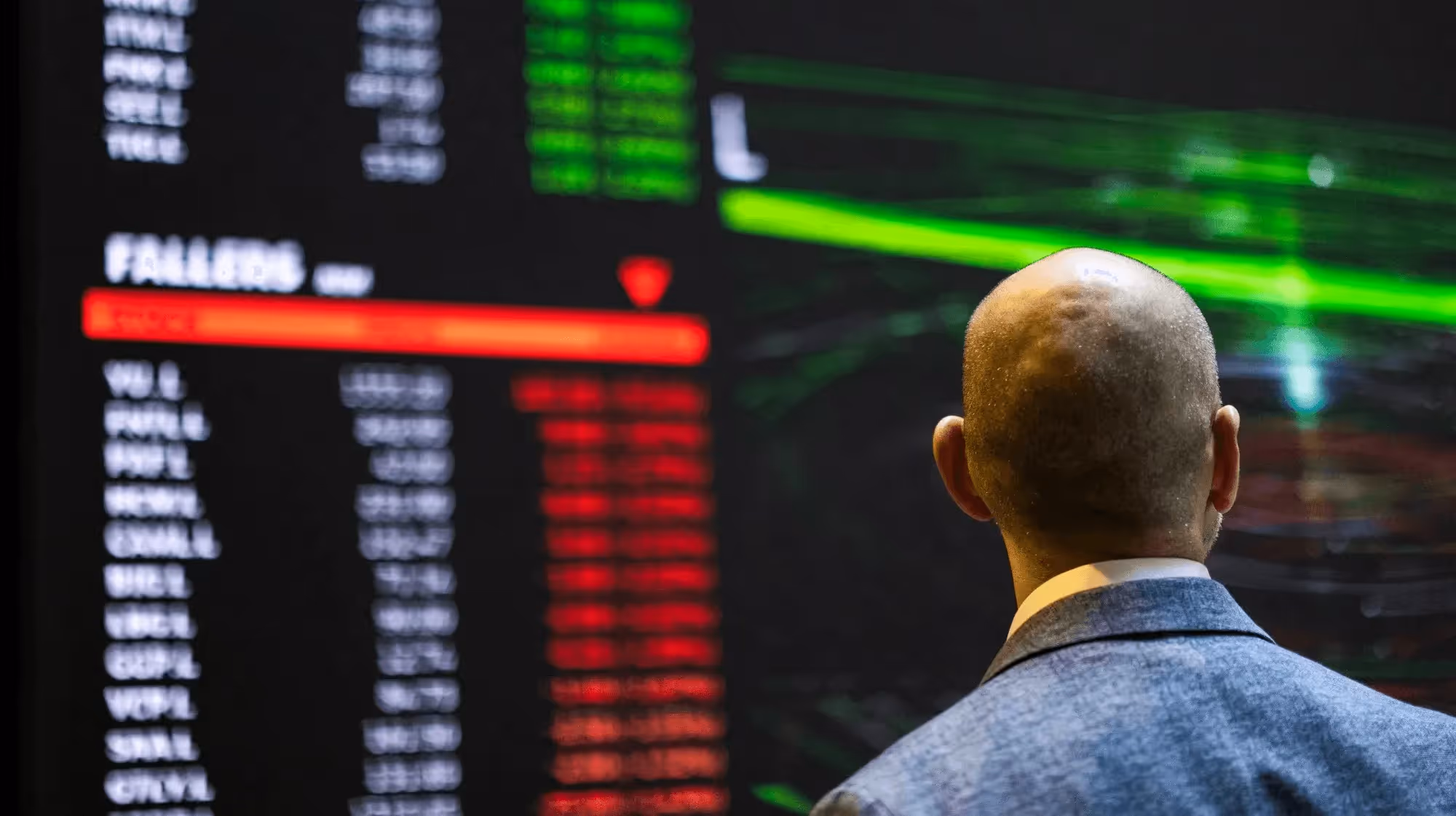 Man viewing real-time stock market data - Can You Day Trade in a Roth IRA