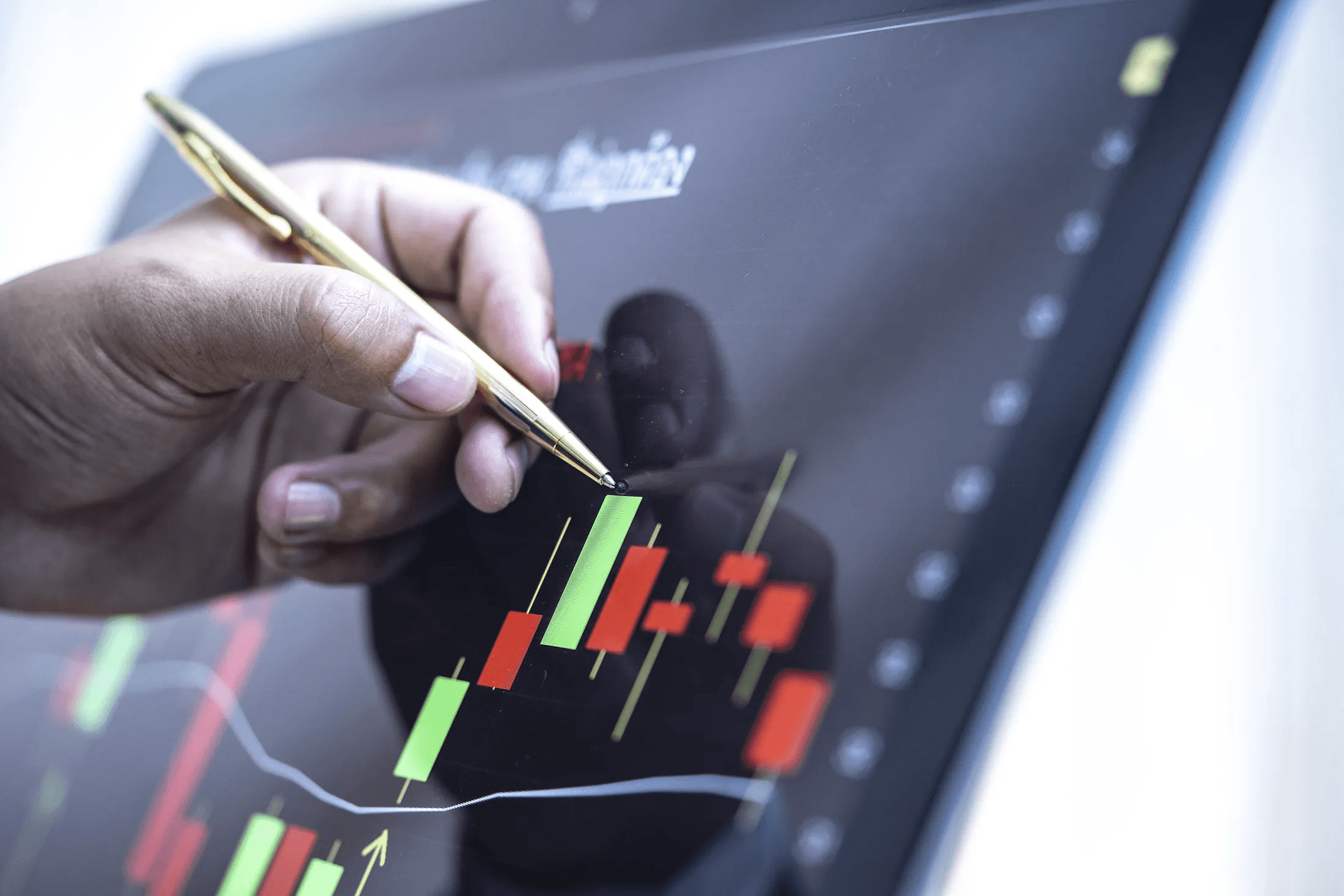  Hand pointing at candlestick stock chart - Synthetic Funded Account