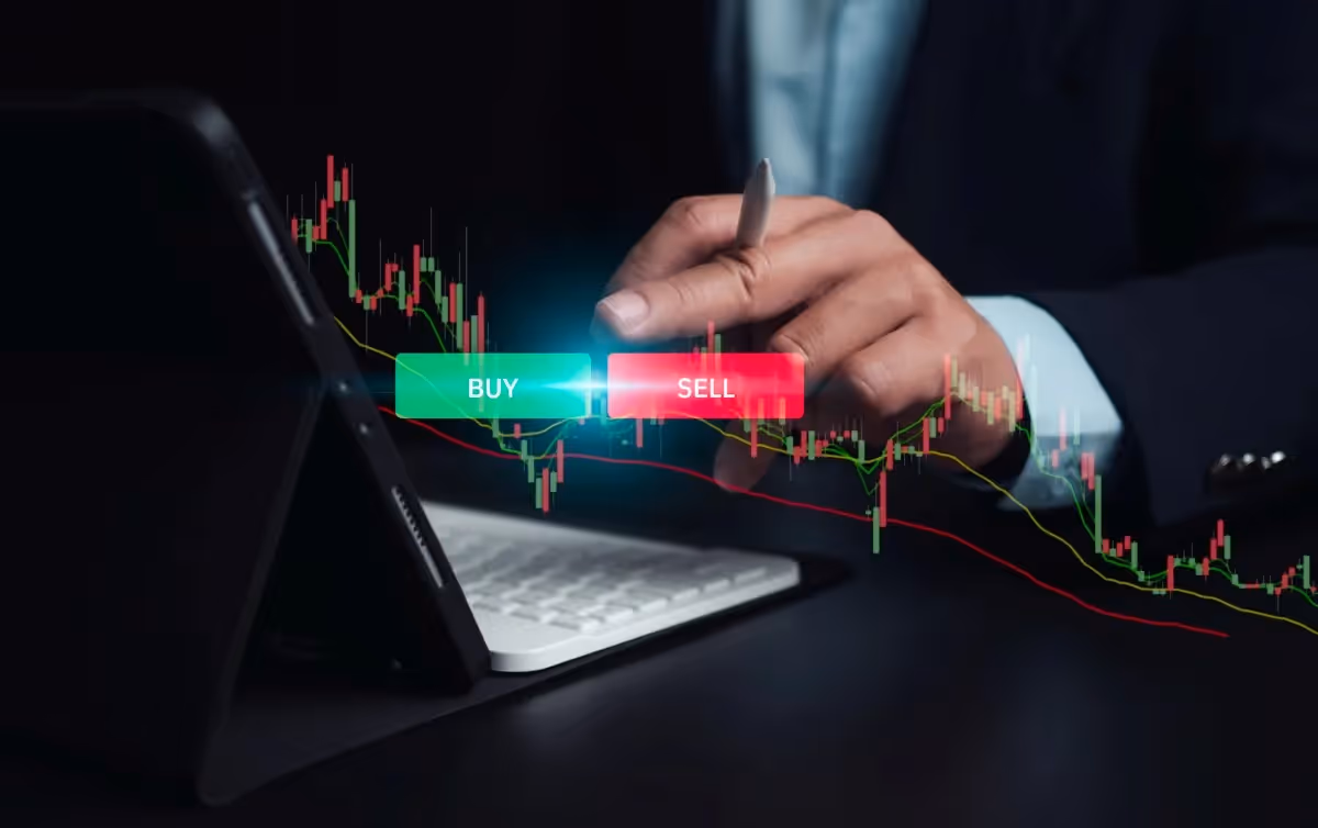 Investors use laptops to analyze stock market, investment strategies. and business growth analysis