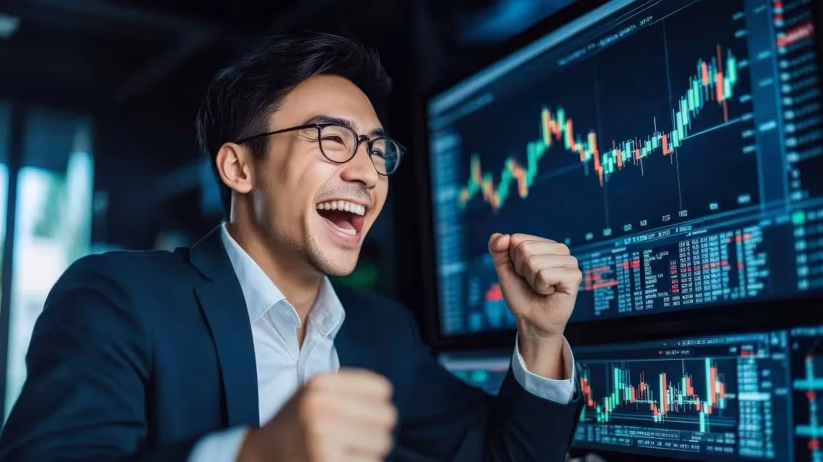asian businessman in suit and glasses on screen