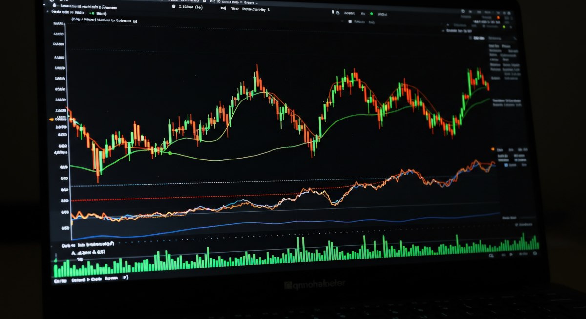 Stock market analysis on laptop display screen financial data
