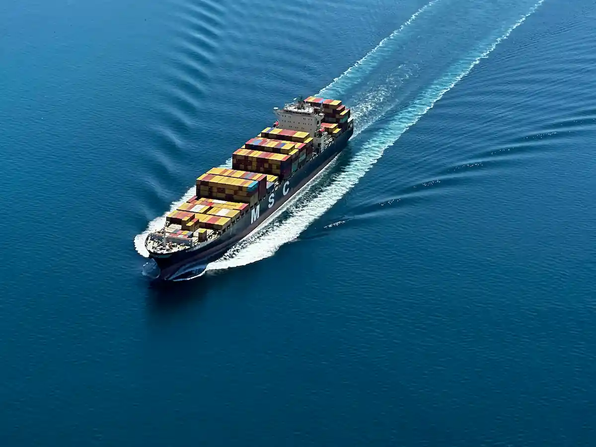 Cargo ship cruising on the ocean