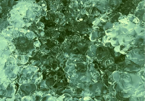 A picture of green water bubbles representing hydrogen