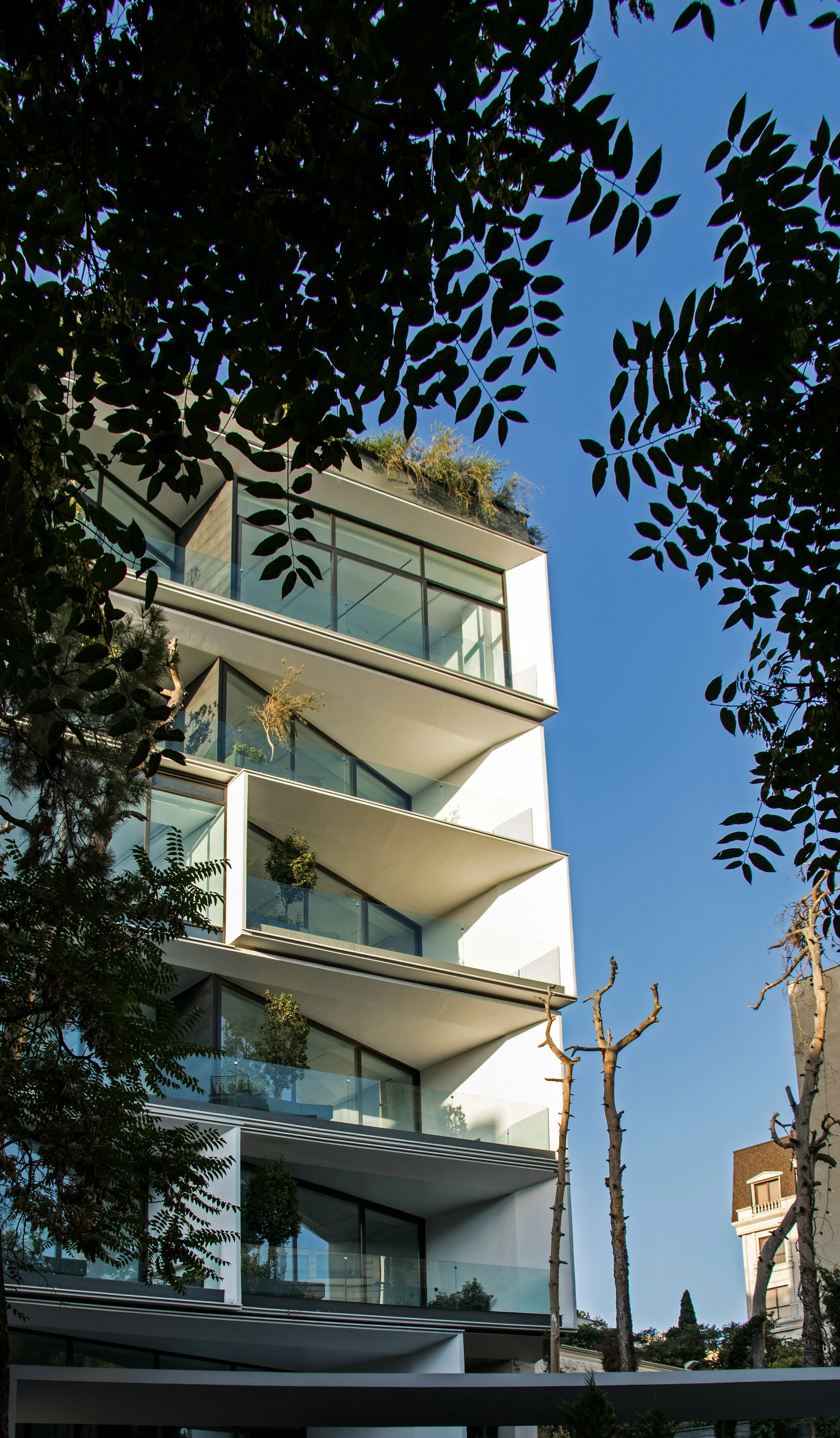 multi story house from outside  with glass front