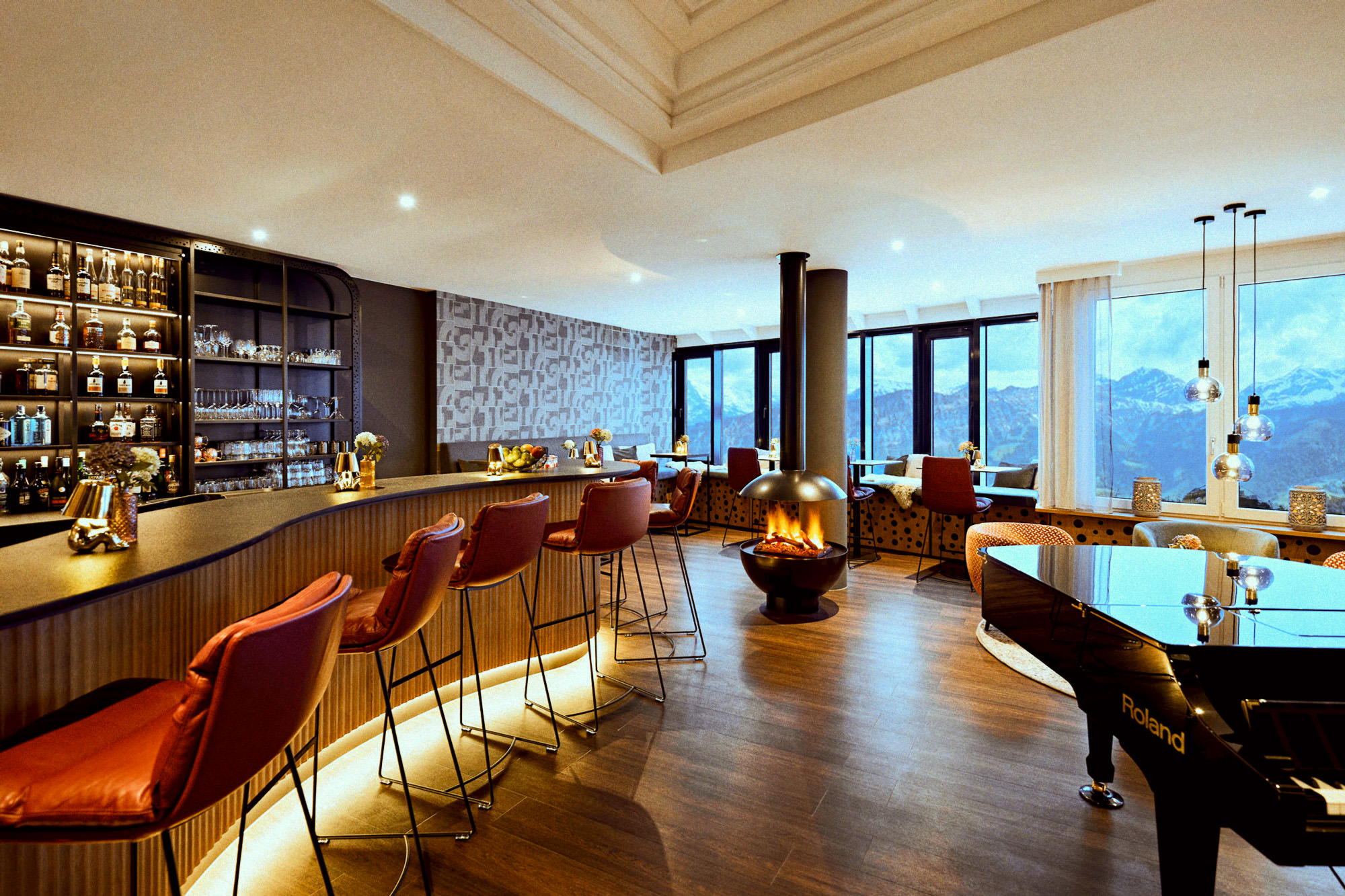 Bar design avec cheminée et vue sur les Alpes suisses – séjour de charme Smartbox Signature