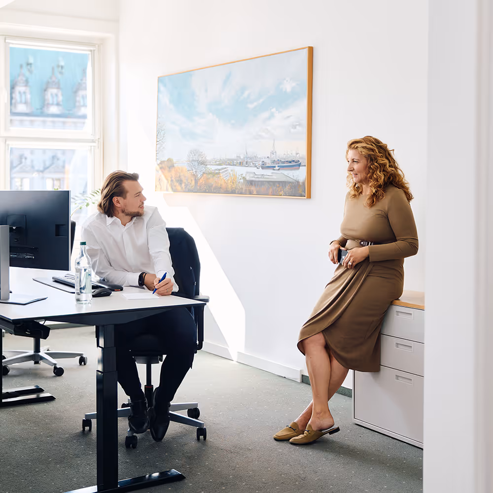 Two persons in an office