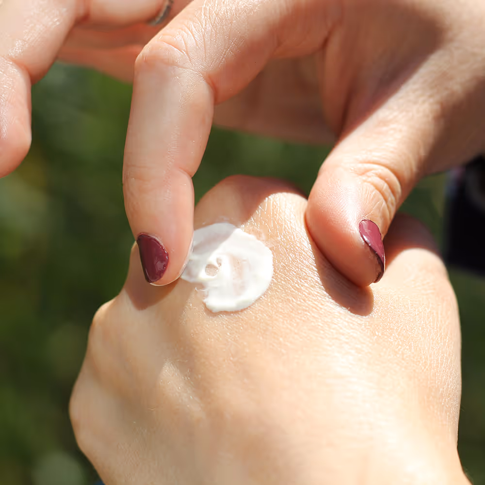 Lotion being applied to hands