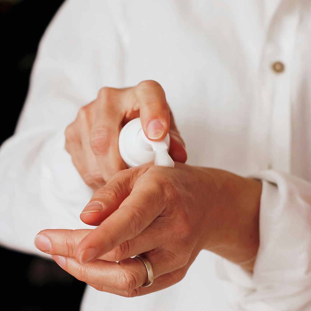 Testing some lotion on a hand