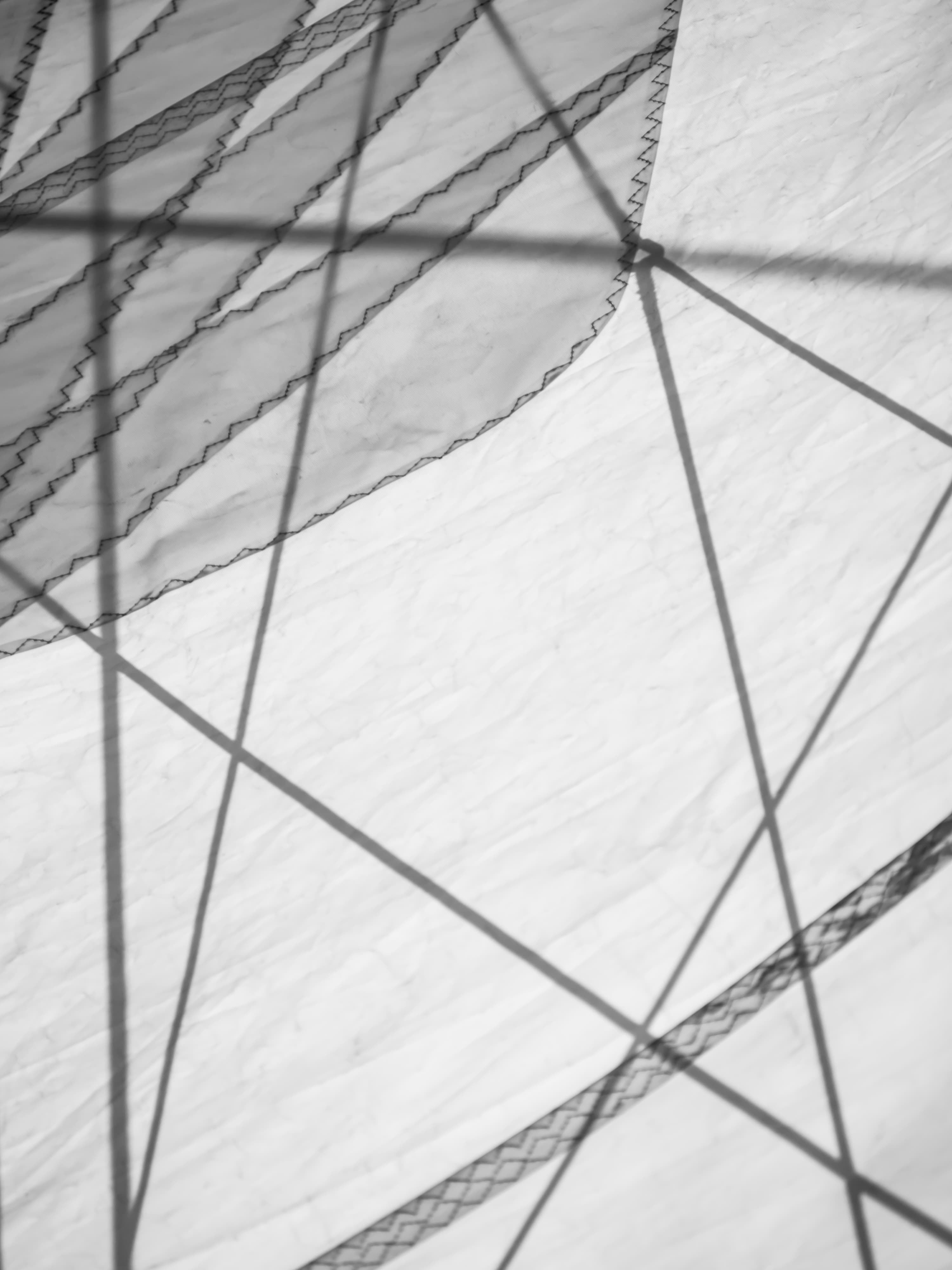 Geometry of white sails — abstract sailing photography by Maison TALI.
