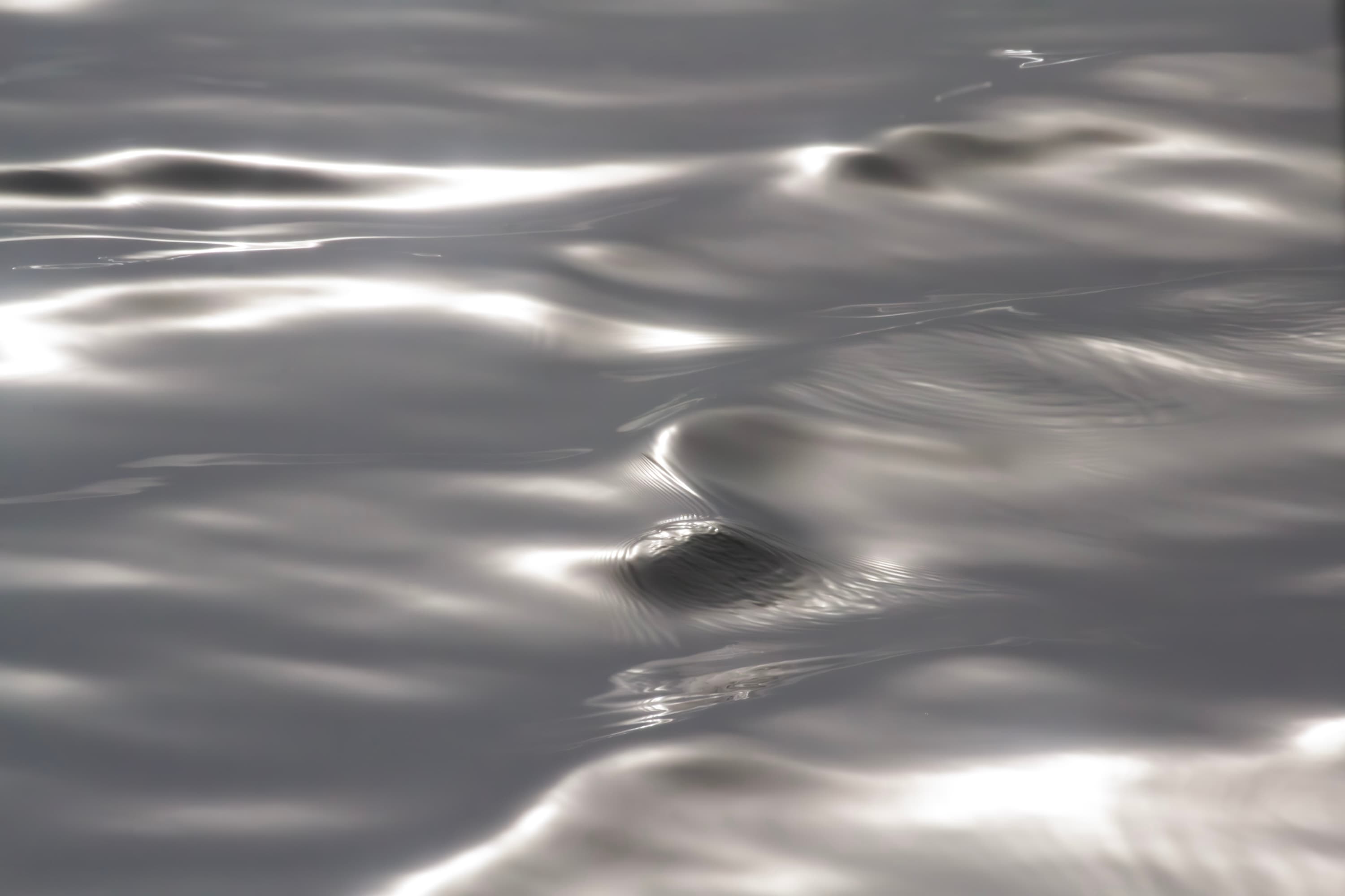 Play of light on still water — fine art photograph from Maison TALI’s From the Heart of the Ocean series.