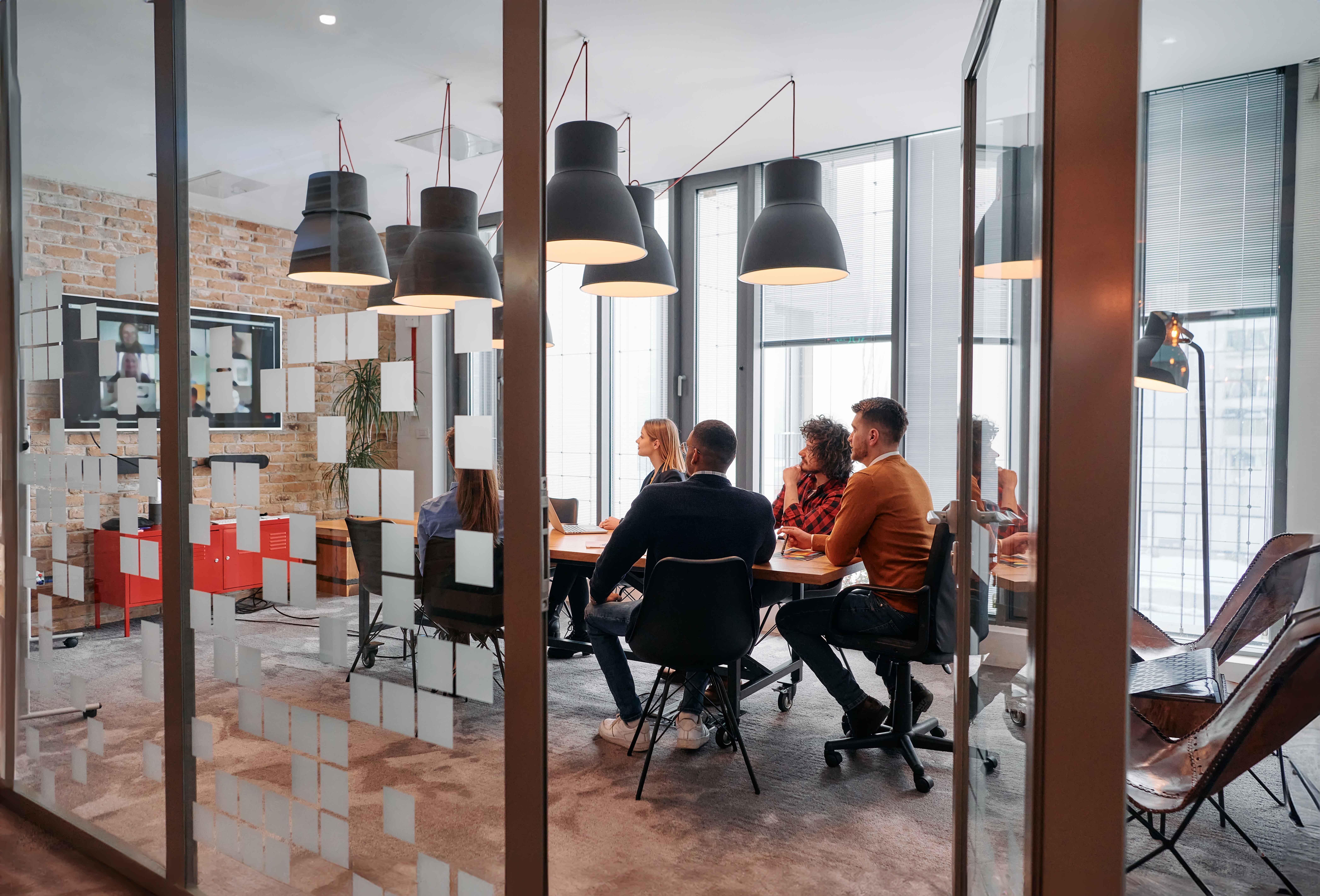 Meeting taking place in modern conference room