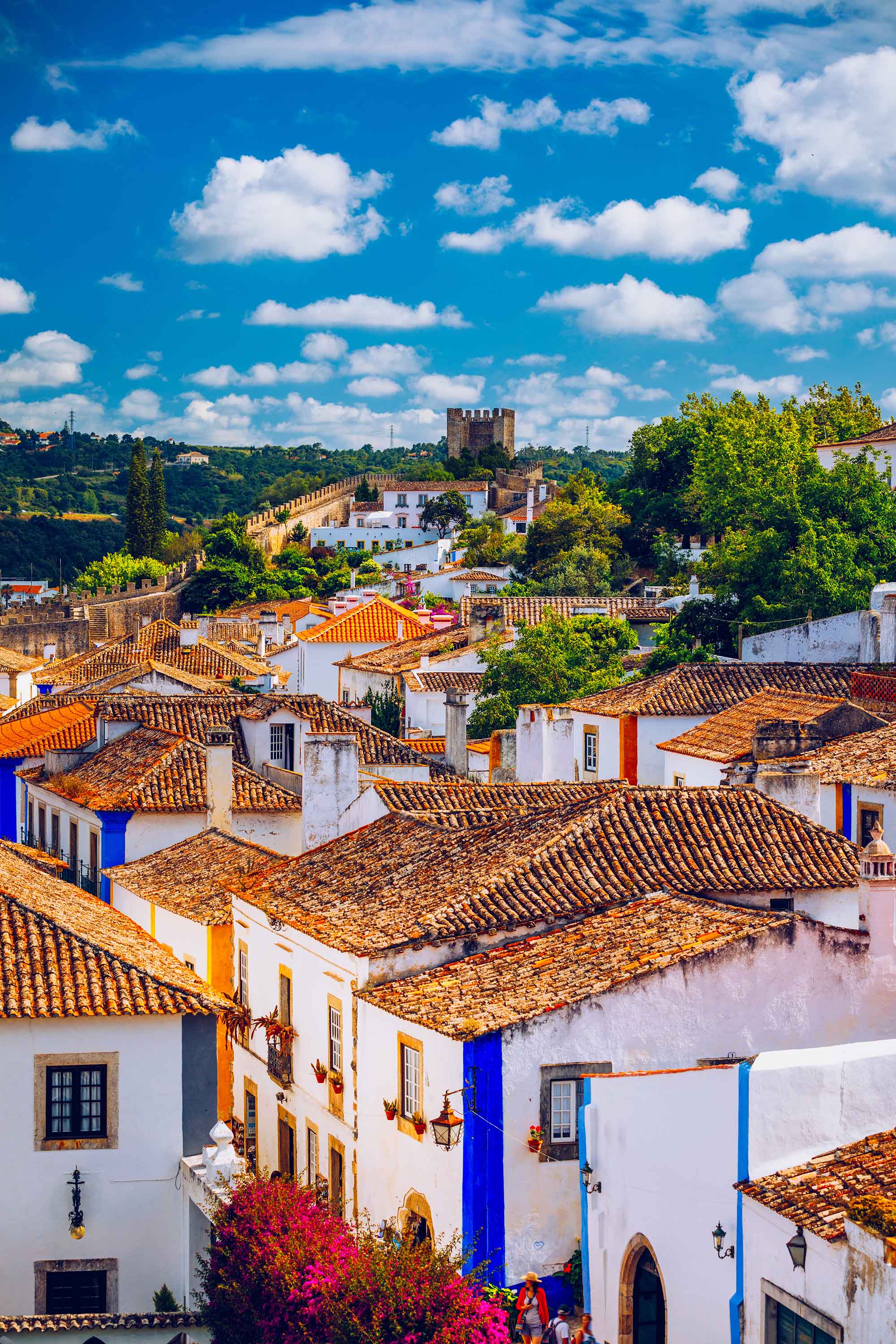 Historic walled town of Obidos, near Lisbon, Portugal. Beautiful streets of Obidos Medieval Town, Portugal.