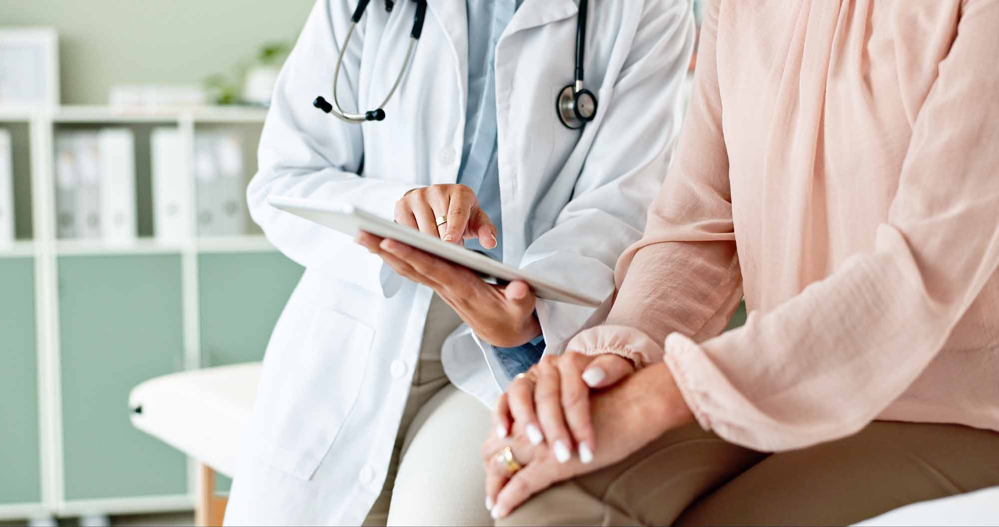 Clinic, tablet and hands of doctor with patient for consulting, medical service and help in hospital
