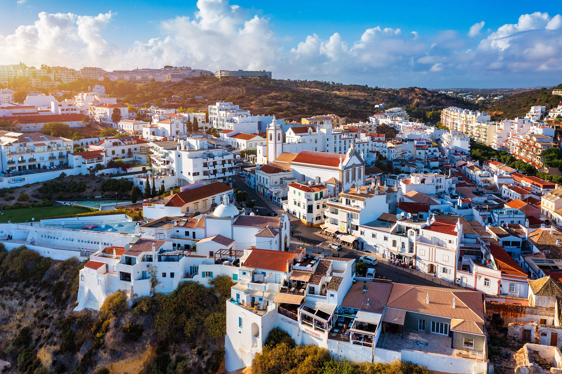 Aerial view of Albufeira, including luxury villas and ocean scenery